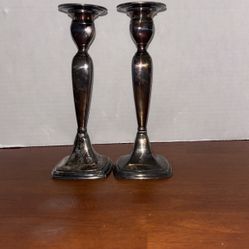 two vintage silver-plated candlestick holders from Forbes Silver Plate Co. 9” Tall Not Polished.B29