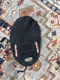 Guts seat cover