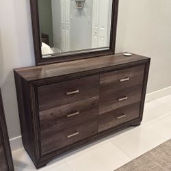 Dresser with attached mirror 