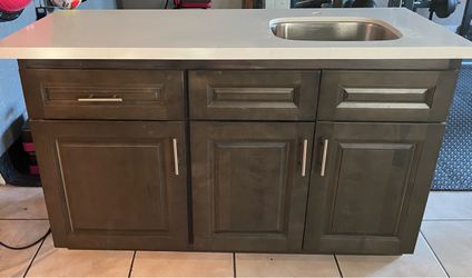 Kitchenette with sink and countertop