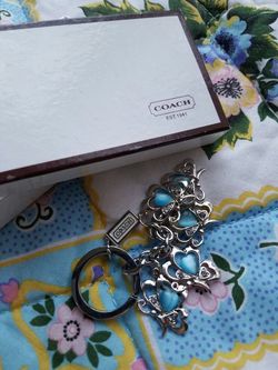 Baby blue Coach keychain