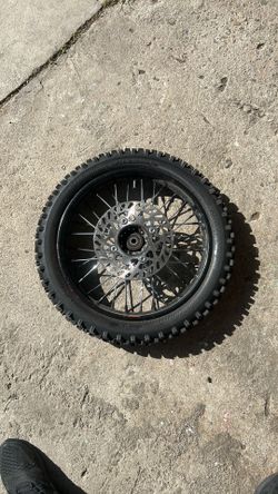 brand new barley used tuttio front wheel
