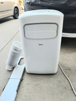 WIRELESS like new portable ac with hose/ window kit/ remote/ blows ice cold air fast/ can test before buying/ can connect to your phone