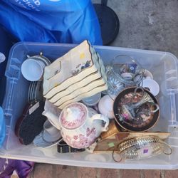 Tote Of Ceramic And Clothes
