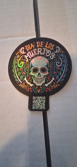 Dia De Los Muertos decal. 3 and a 1/2 inches.