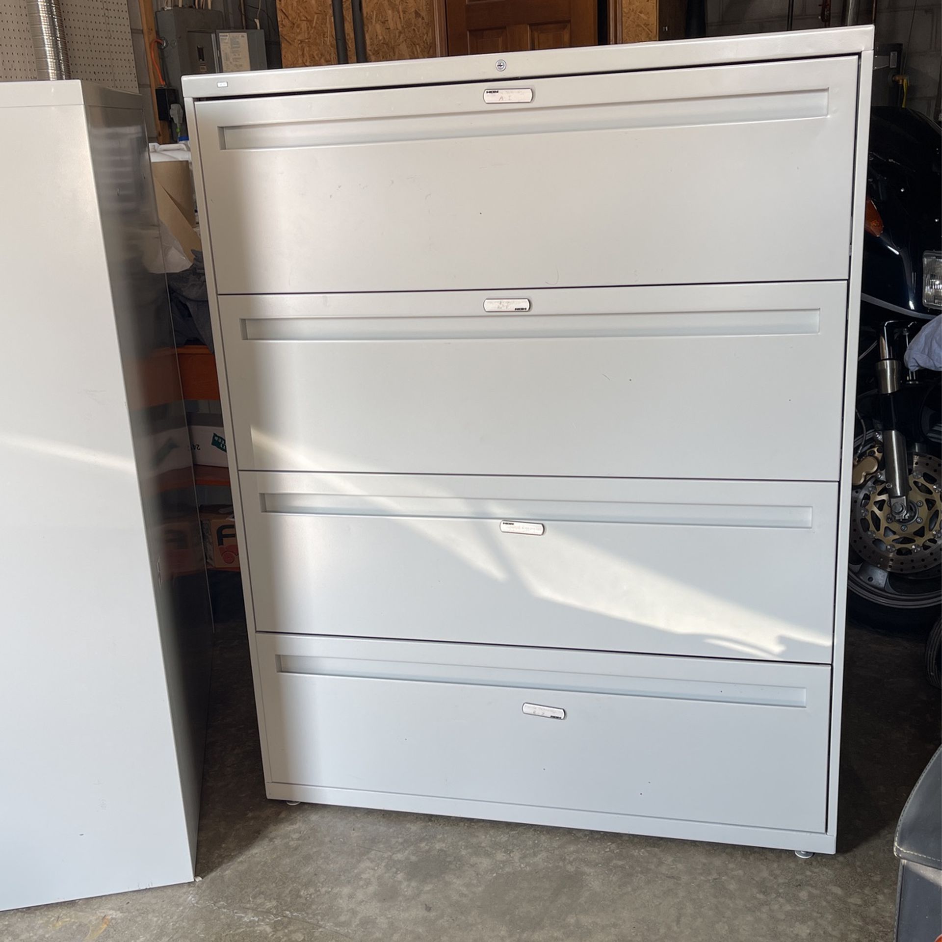 FILE CABINET.     DELIVERY AVAILABLE     4 Drawer Filing Cabinet Qty. (2).                 $100Each.    