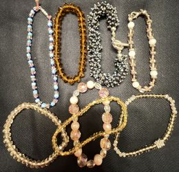 8 Crystal & Glass Bead Bracelets. 
