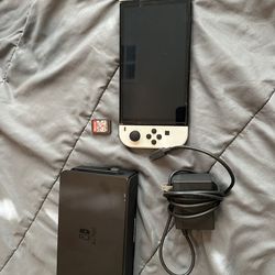 Nintendo Switch OLED with Mario cart 8 deluxe