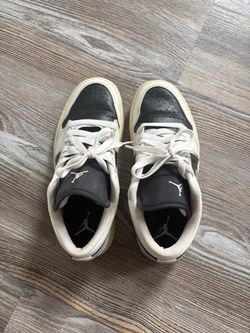 Air Jordan 1 Low Black and Cream Sneakers