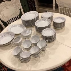 Complete set 77pieces ( Valmont china royal wheat w/ silver rim)  No cracks - like new 12 coffee cups     2 serving bowls 12 dessert bowls  12 salad b