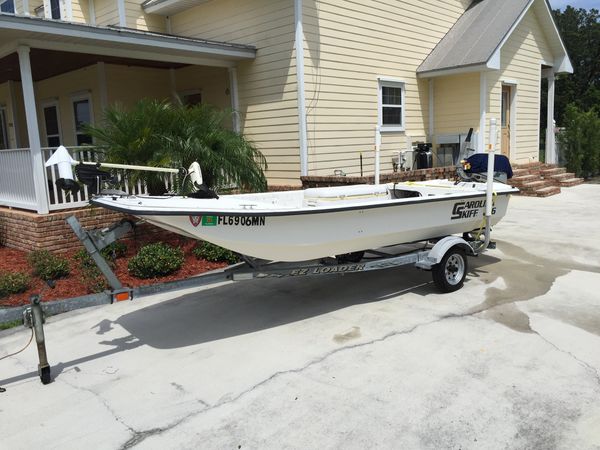 2004 Carolina Skiff w magic tilt trailer and 20 Honda 