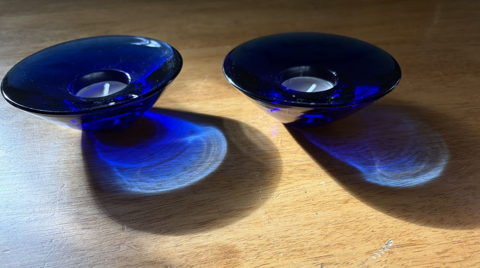 2 Vintage Cobalt Blue Candle Holders with candles included. Good quality.
