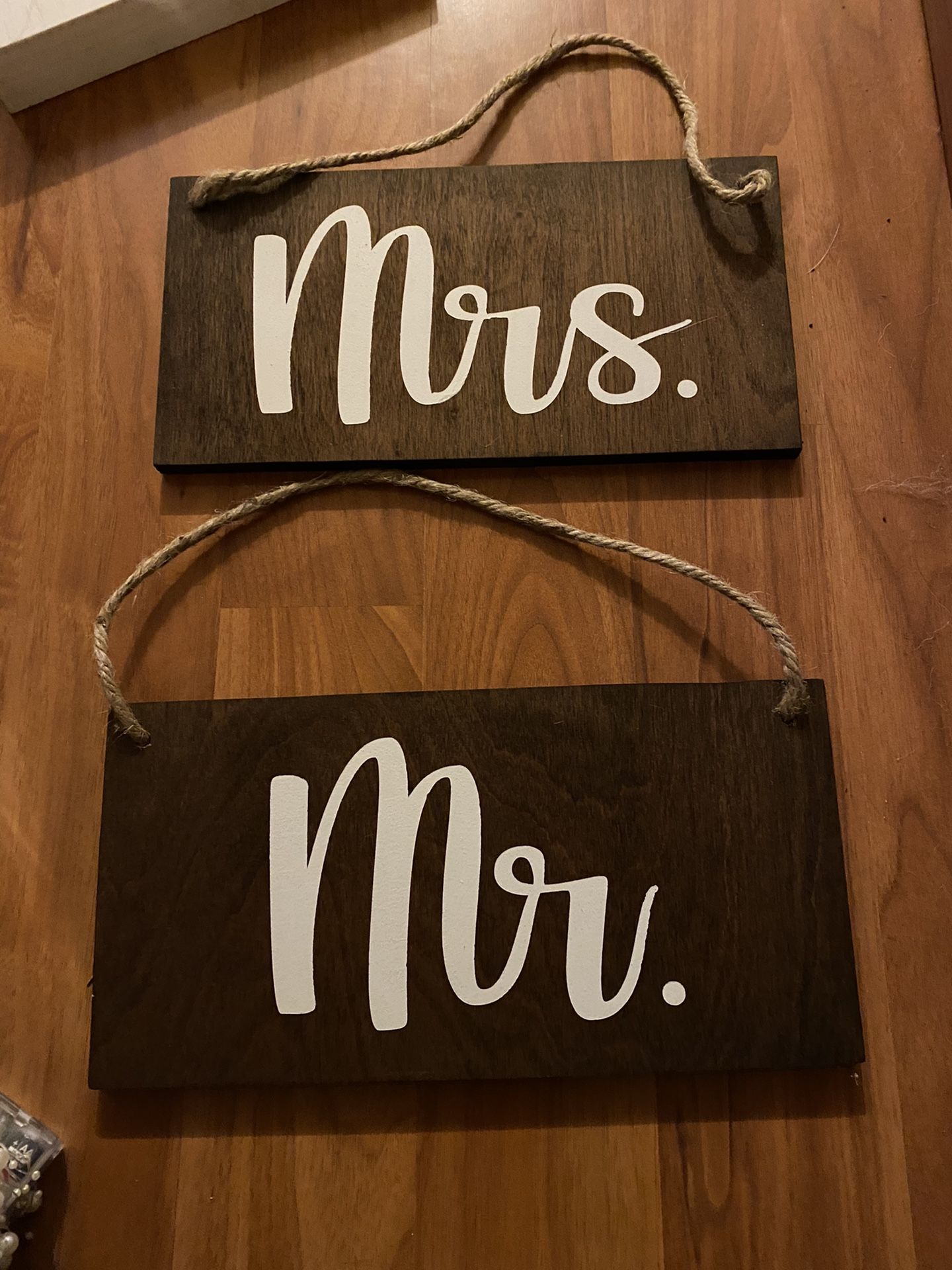 Hanging Mr and Mrs wedding sign