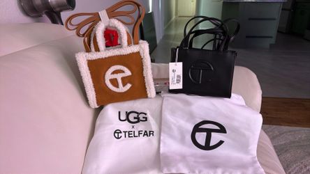 Two mini UGG purses  with covers