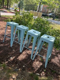 FDW Metal Bar Stools Set 4 Counter Height  29 inches  Stackable blue  pre-owned in good condition