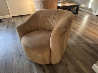 Two Beige Suede Swivel Chairs