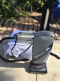 Two Oreck vacuums bagged vacuum with Registration