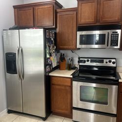 Refrigerator, stove and Microwave. 