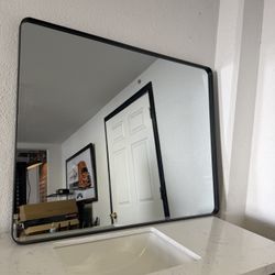 Mirror Has A Black Aluminum Frame Rust Free 