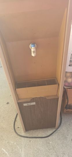 FREE WATER DISPENSER WITH TWO  5 GALLON CONTAINERS