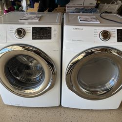 Samsung large front loading washer dryer in White. See description, Carlsbad 92010.