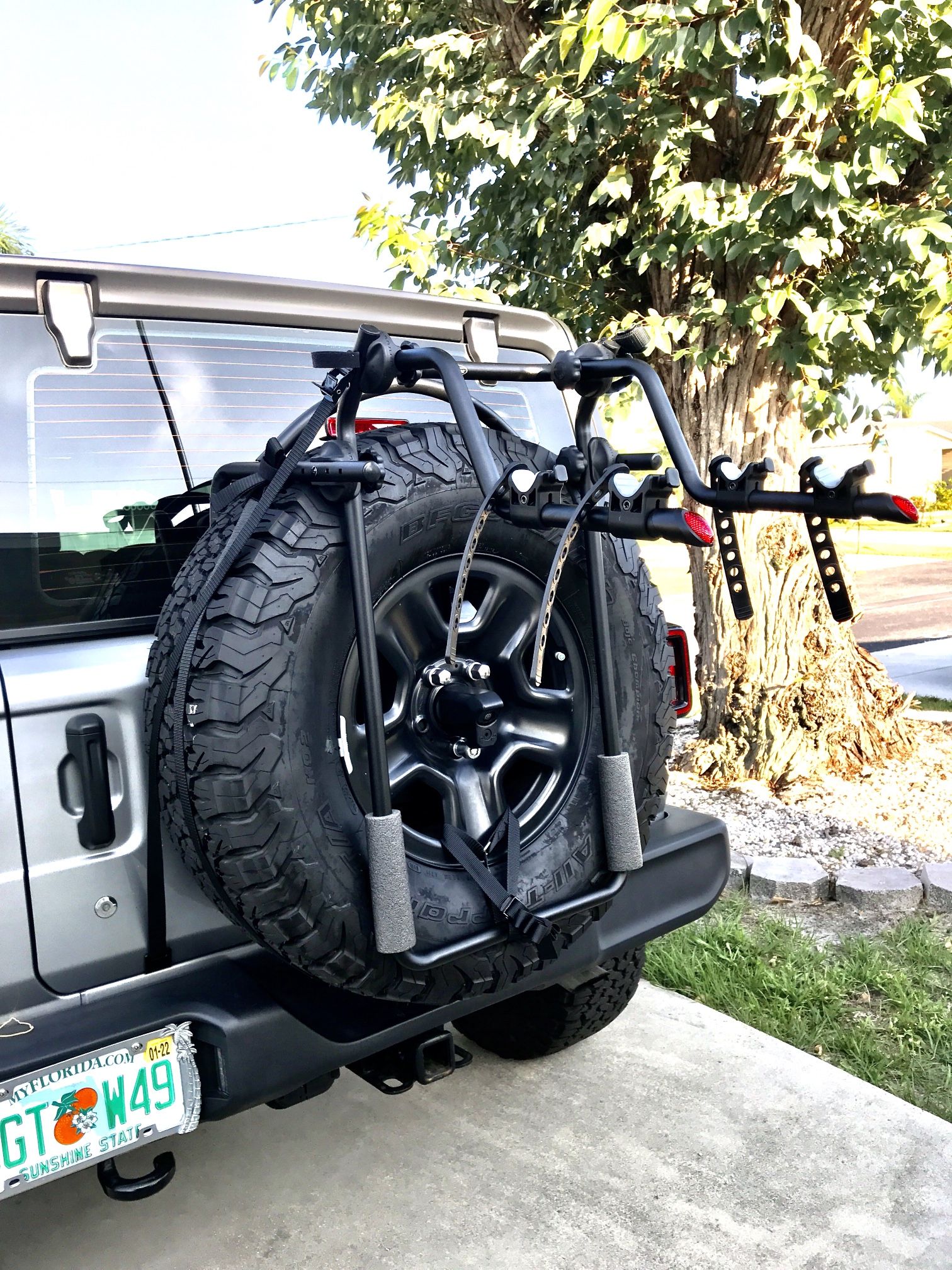 Spare tire bike rack holds two bikes