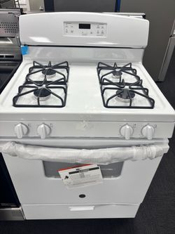 Ge white 4 burner gas stove with computer module
