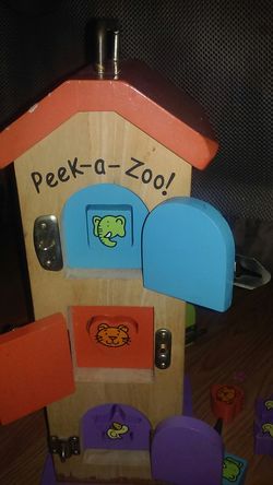 Peek a zoo education puzzle/toy