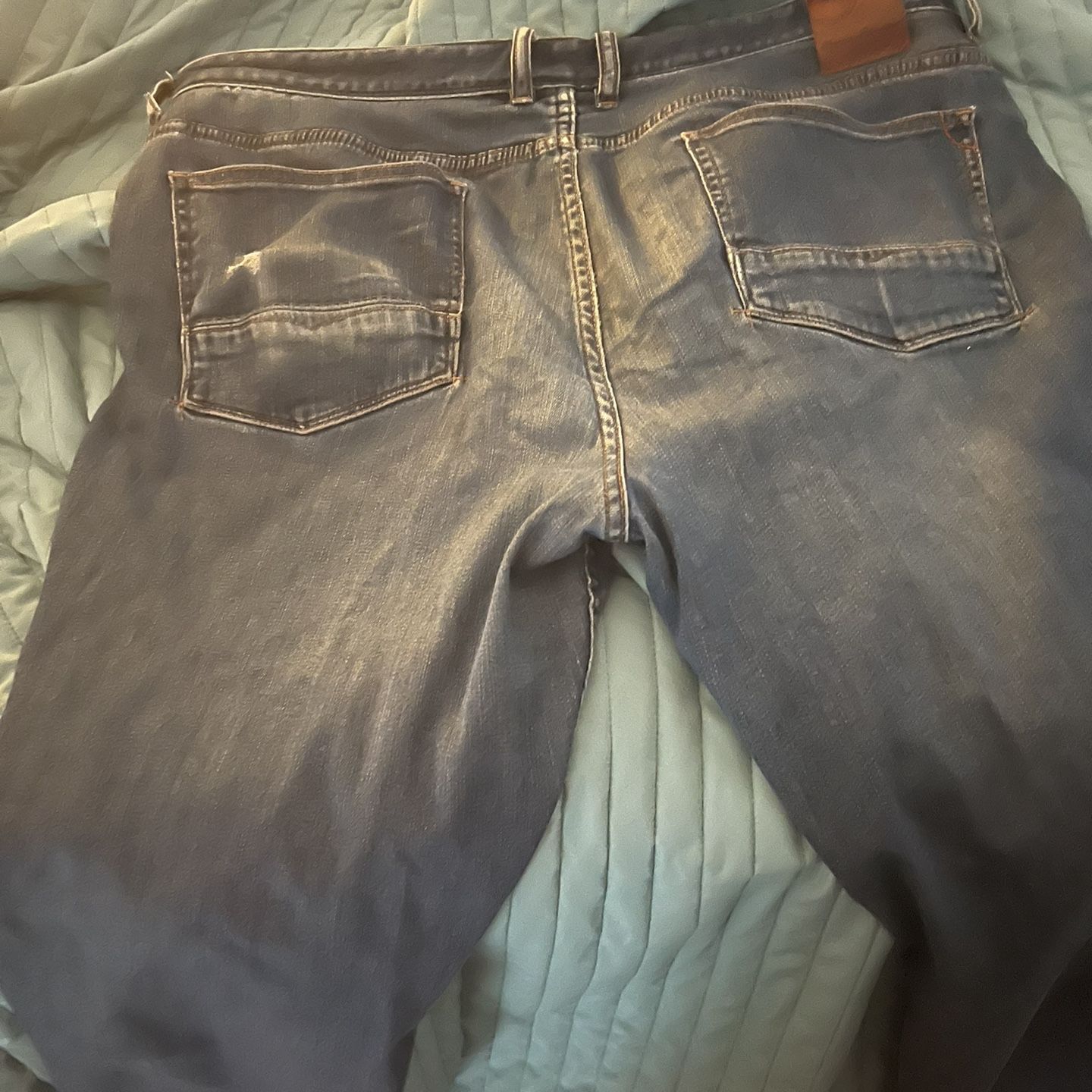 Well Worn Used Tommy Bahama jeans 38x30