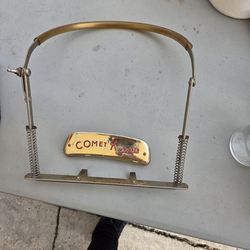Vintage Hohner Comet harmonica and holder
