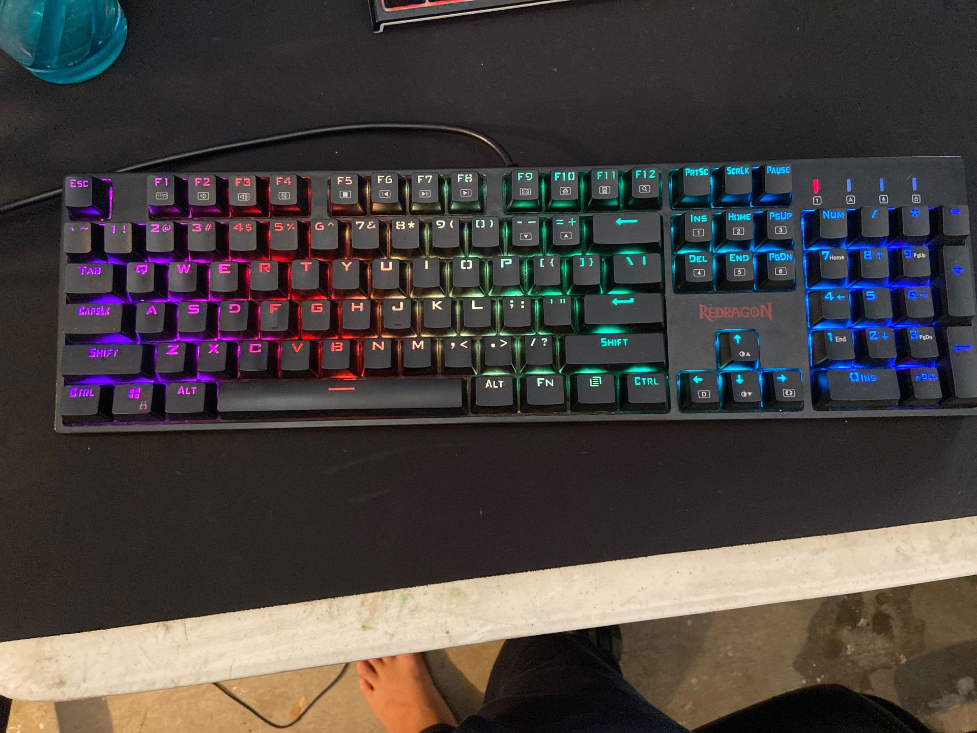 Redragon full-sized back lit gaming keyboard with redragon silent red switches (NEGOTIATIONABLE)