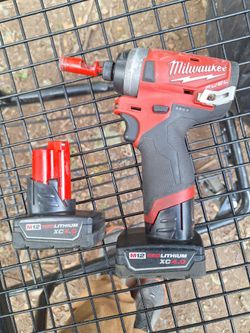 M12 1/4 inch impact driver with 2 XC4.0 batteries and charger