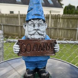 Gnome Holding Go Away Sign
