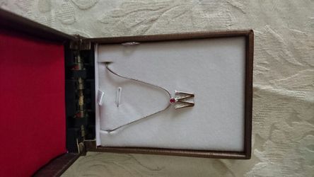 Pendant with "W" initial