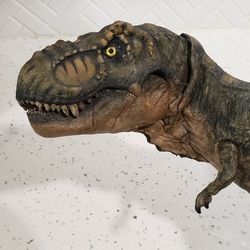 Throw me a number on this custom T. Rex  with 2 dead dinosaurs
