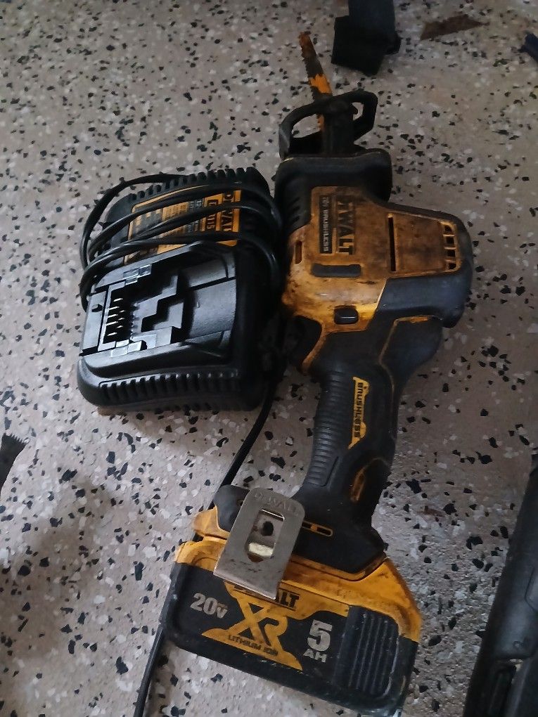 Dewalt Better Saw Tool Everthing works and you get the charger.