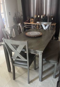 Dinner table with four chairs
