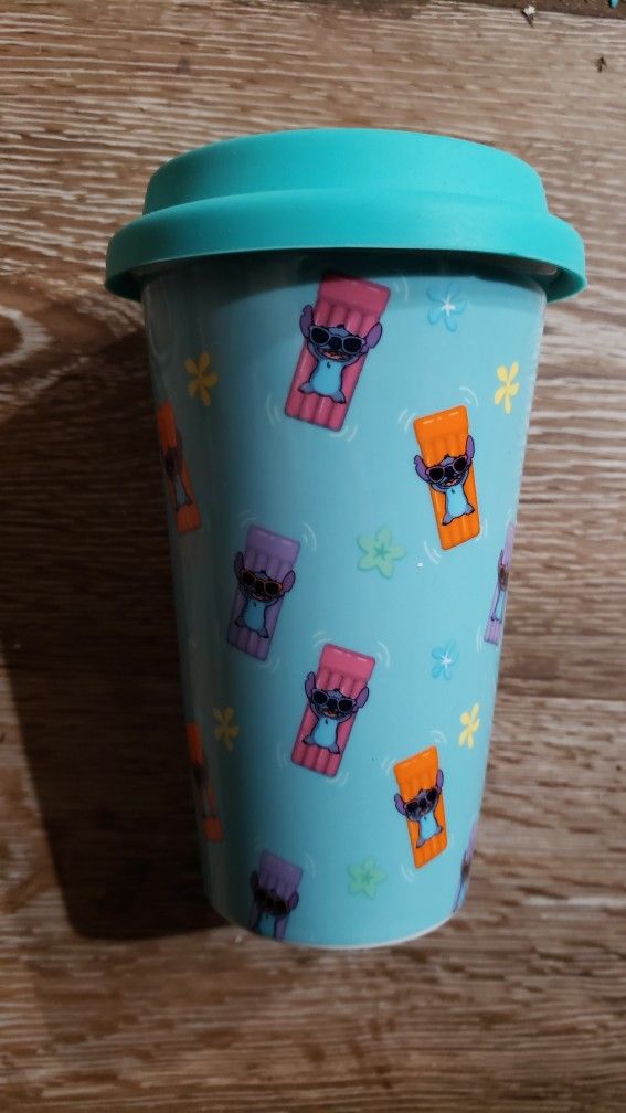 New disney ceramic tumbler of stitch with silicone lid ..