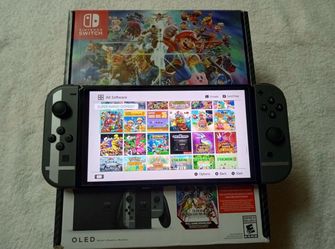 NINTENDO SWITCH OLED with 125 SWITCH GAMES