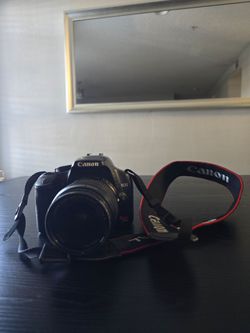 Canon Rebel DSLR Camera + Lens