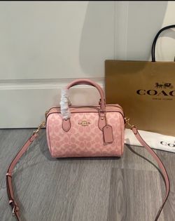 Pink Coach crossbody purse