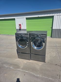 LG Front Load Washer and Dryer Set with Pedestals