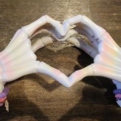Heart Shaped Skeleton Hands With Bracelets