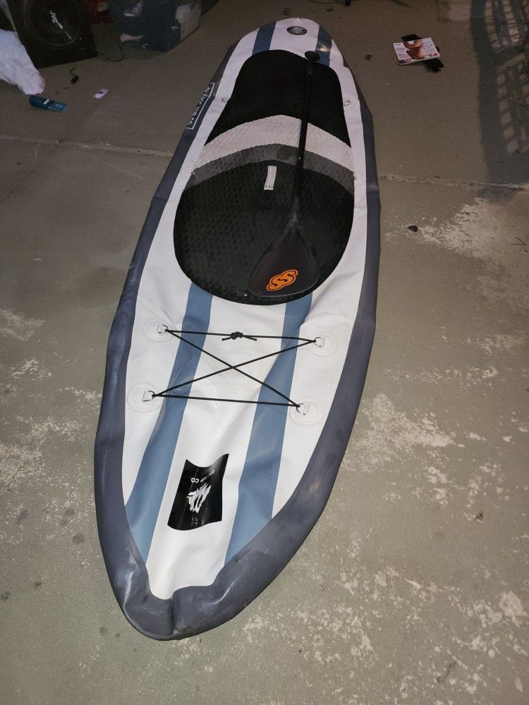 Tabla De Surfin De Aire Con Su Remo Puddle