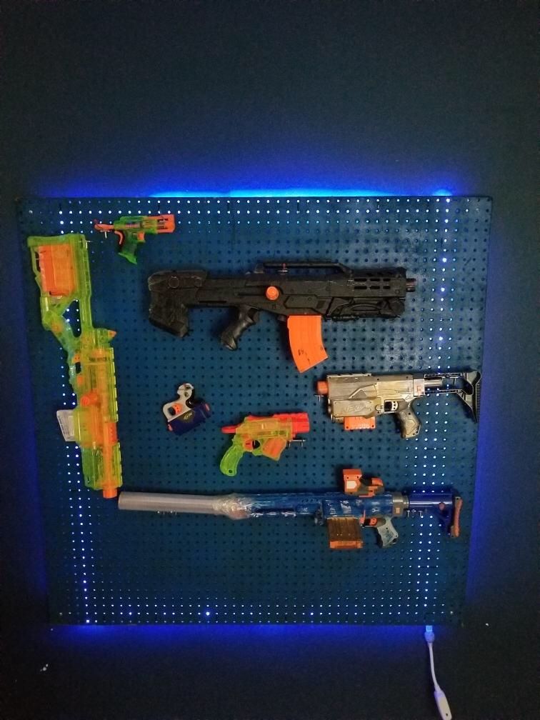 Custom Nerf peg board with color changing LED light
