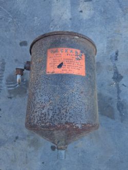 Vintage packard oil canister