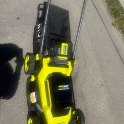 Lawmover ryobi push 20 inch  used like condition as is come w regular charger & 6ah battery