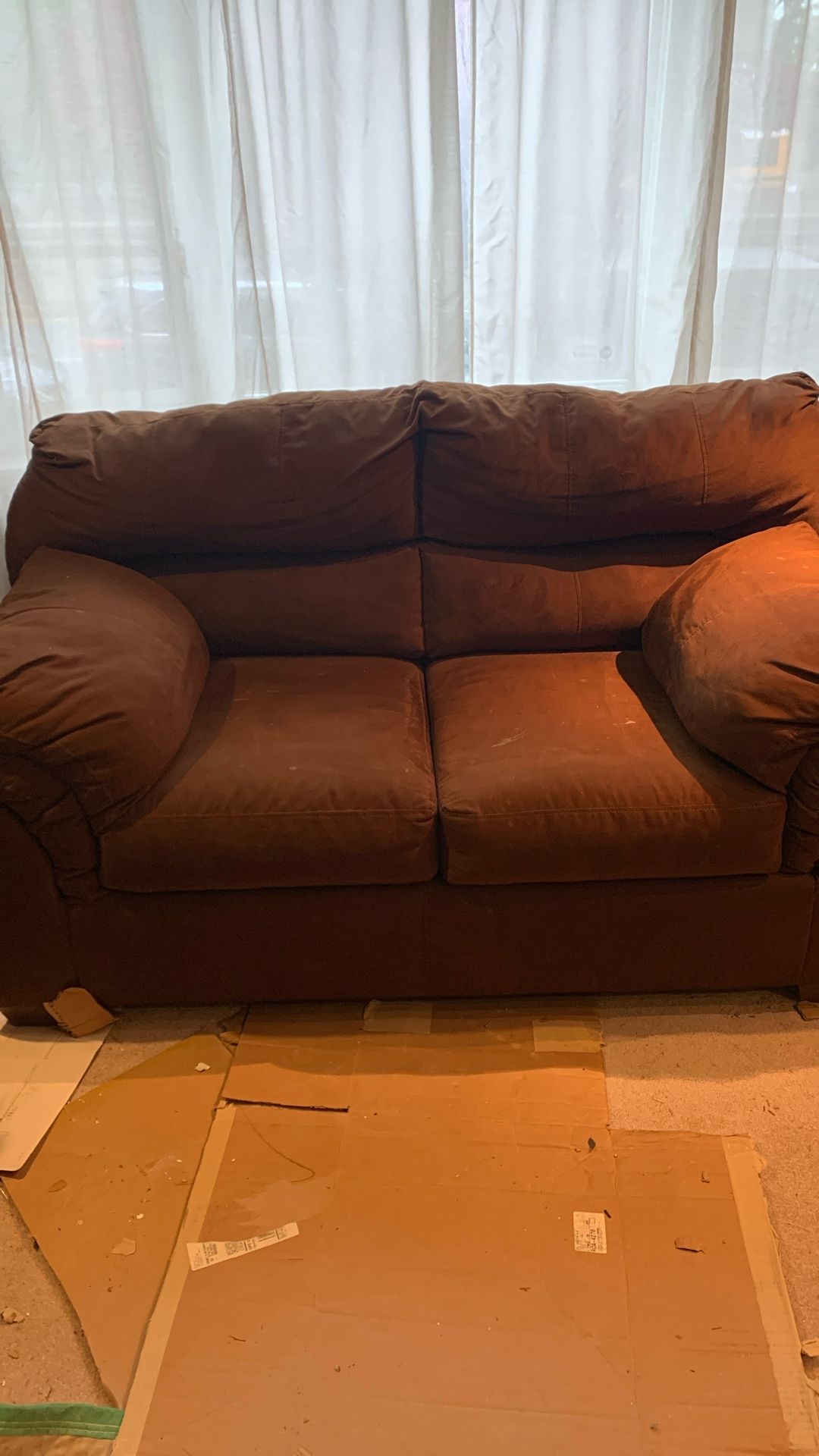 Brown love seat