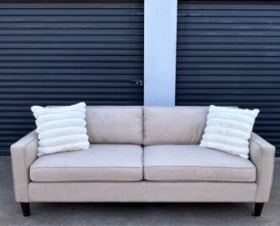 Tan 2 seater sofa