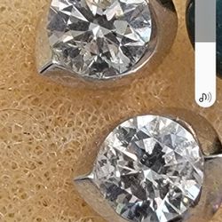 Beautiful Diamond Earrings In 14 K White Gold Infinity Setting